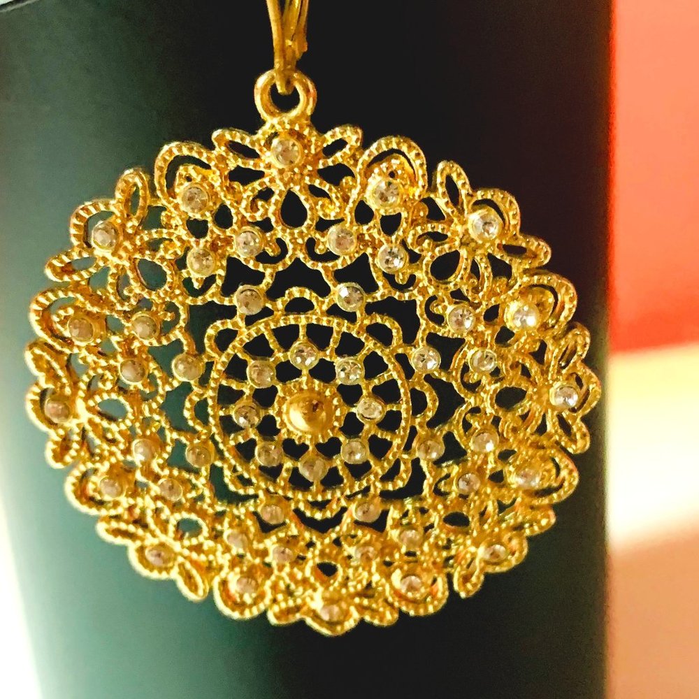 Gold metal, round cut out drop earrings